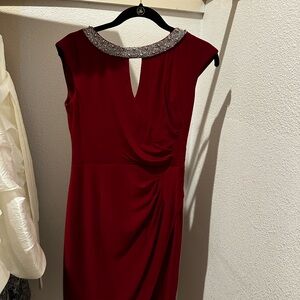 Elegant Red Dress with Embellished Neckline